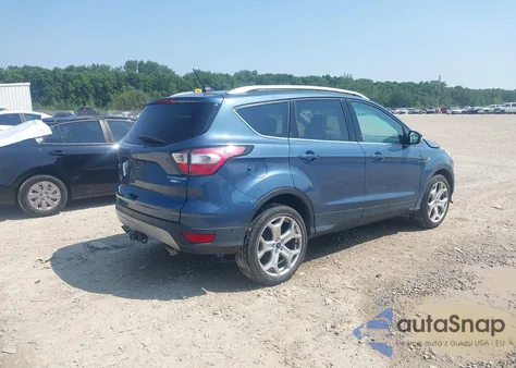 2018 Ford Escape Titanium z USA, uszkodzony, nr VIN 1FMCU9J95JUA44374
